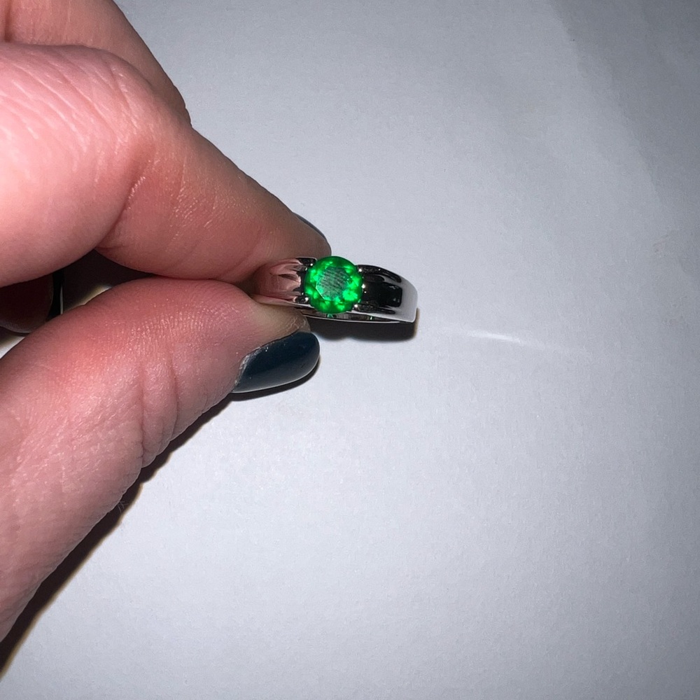 Sterling silver and green crystal ring.